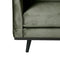Sofa 3 places en velours vert avec quatre pieds en métal noir.