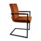Set de 2 chaises, le piétement en métal noir contraste avec le velours orange. 